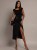 CZARNA-SUKIENKA-MIDI-Z-KLAMRA-I-ROZCIECIEM-KOBIECA-I-STYLOWA-ELEGANCKA-S-M-Marka-bez-marki (1).jpeg