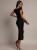 CZARNA-SUKIENKA-MIDI-Z-KLAMRA-I-ROZCIECIEM-KOBIECA-I-STYLOWA-ELEGANCKA-S-M-Dlugosc-midi.jpeg