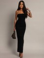 CZARNA-TUBA-DOPASOWANA-SUKIENKA-ROZCIECIEM-Z-TYLU-DLUGA-BEZ-REKAWOW-S-M-Model-29A25.jpeg